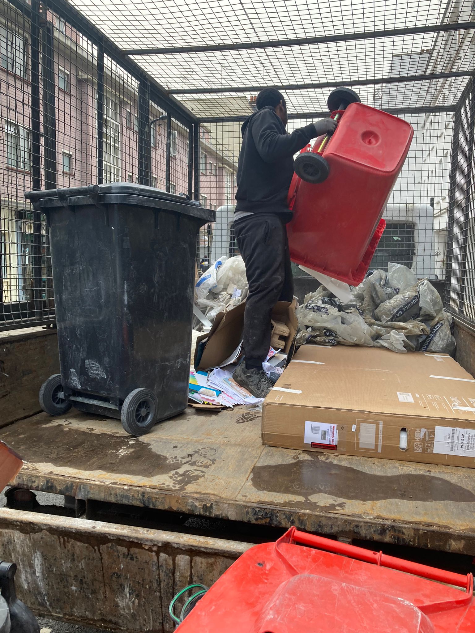 Rubbish Clearance Sussex - Loading Domestic and Commercial Waste on a Removal Truck